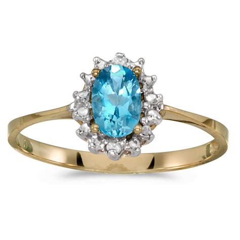 14k gold and blue topaz ring